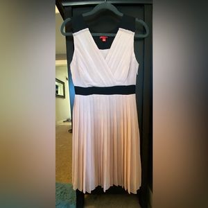 A classy nude rose n black dress. Pre loved.